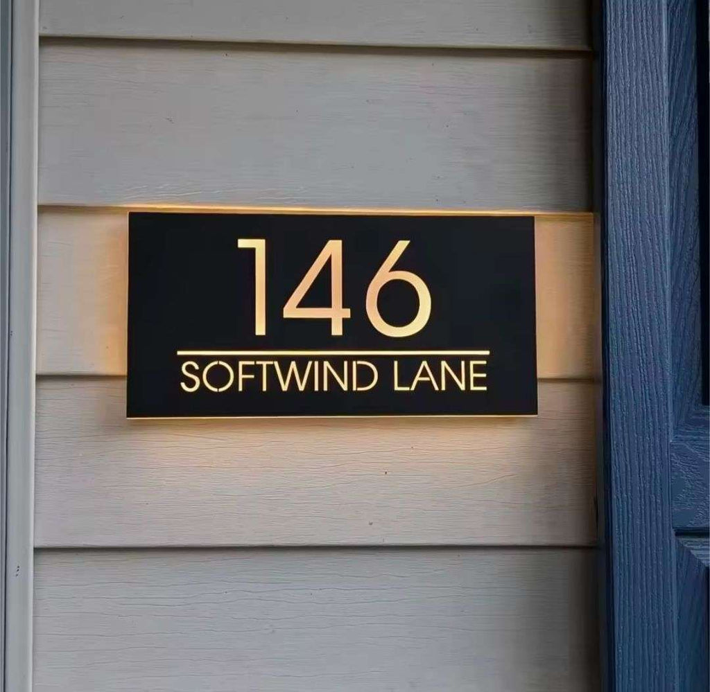Custom warm white LED light-up rectangular house letterbox address sign displaying 146 Softwind Lane.