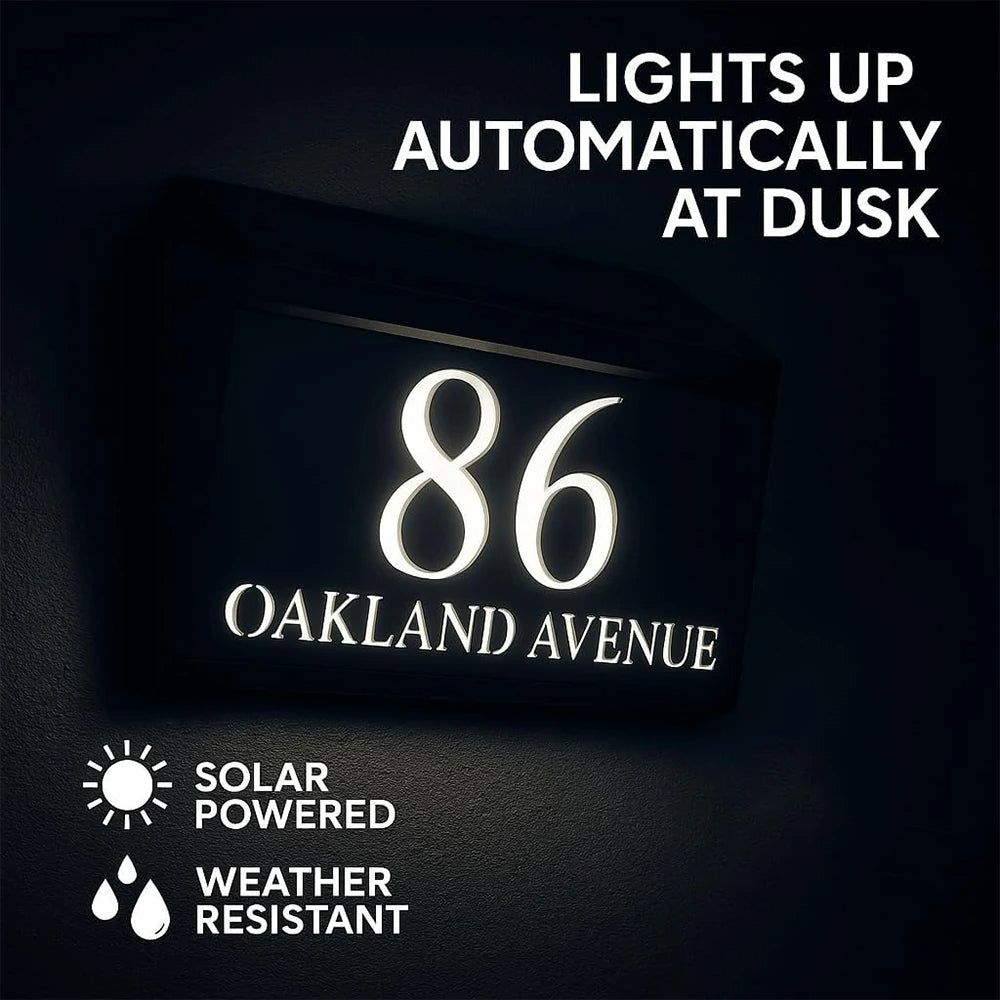 Solar-powered modern acrylic house sign glowing at dusk with custom address 86 Oakland Avenue, weather-resistant design.