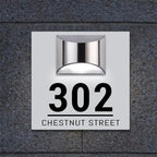 Square solar-powered custom acrylic house sign with address 302 Chestnut Street and modern light fixture