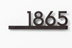 Custom modern floating house number plaque in black with a sleek, minimalist design and 3D effect.