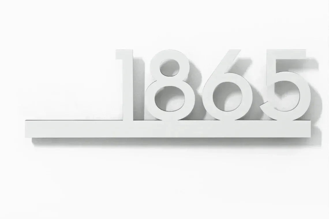 Custom modern floating house number plaque in white with a sleek 3D raised design on a white background