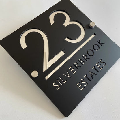 Custom black acrylic square house plaque with number 23 and text Silverbrook Estates on standoffs