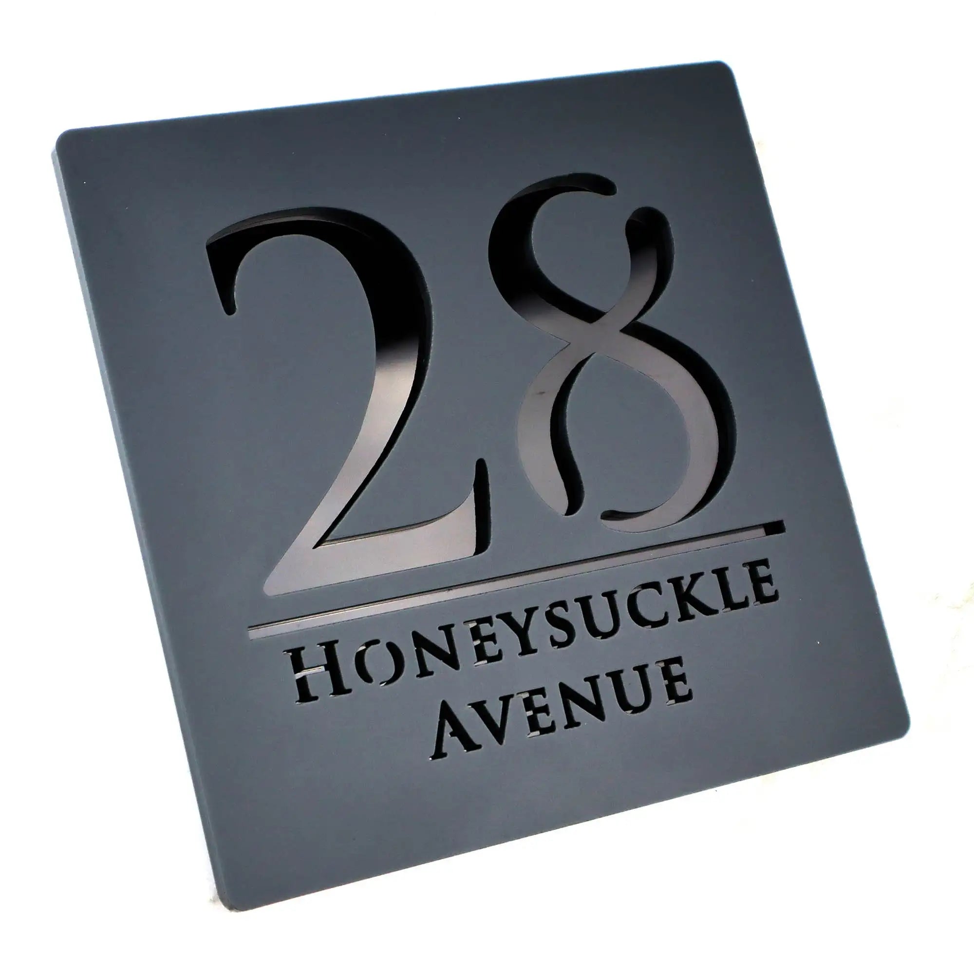 Custom black acrylic square house letterbox sign with cut-out number 28 and Honeysuckle Avenue text
