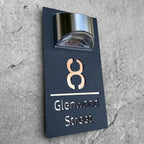 Rectangular black acrylic house sign with solar light and cut-out number 8 and Glenwood Street text